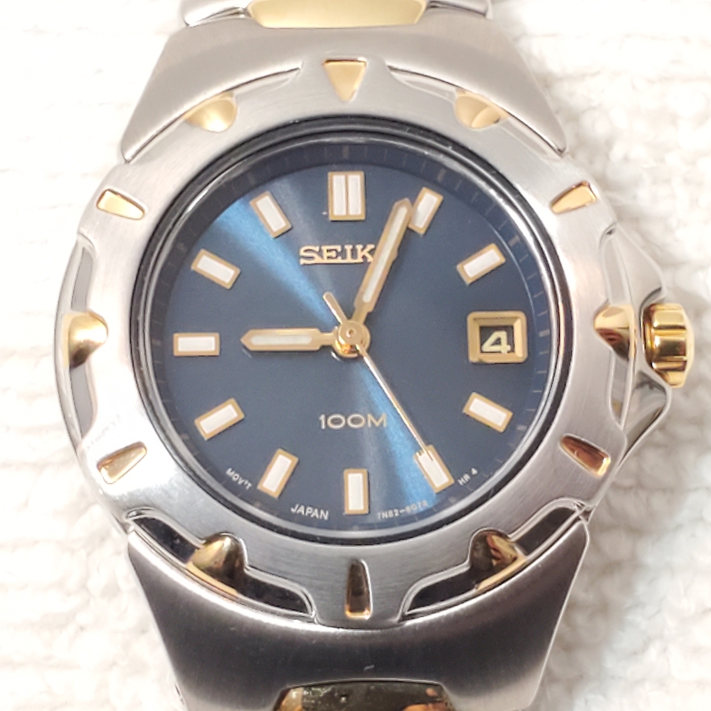 Vintage Seiko Gold Tone Stainless Steel Blue Dial Date Women Watch WR 100M